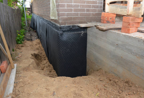 SJ Waterproofing Pros technician performing targeted Interior Drainage System assessment in Avenel, NJ